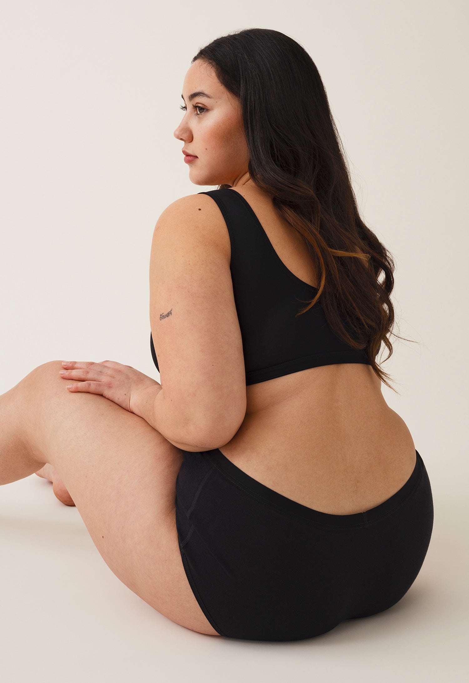 Braga menstrual hipster, flujo medio, negro